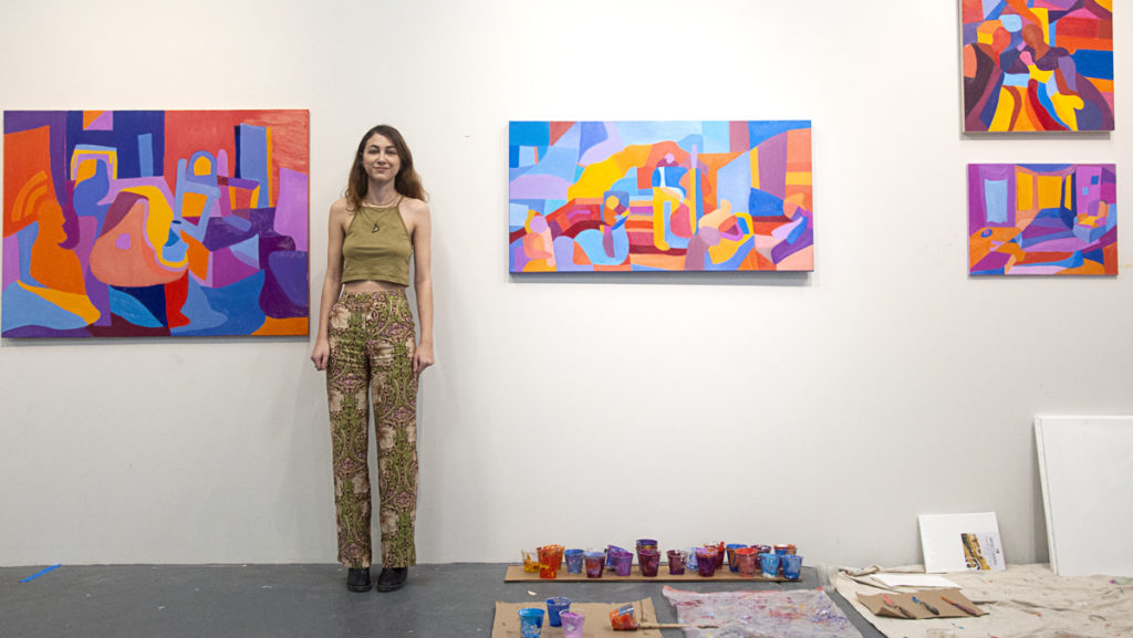 Senior Elizabeth Goldberger is a public and community health major, but is showcasing her work as part of an independent study project. Her work portrays colorful spaces in oil paints.