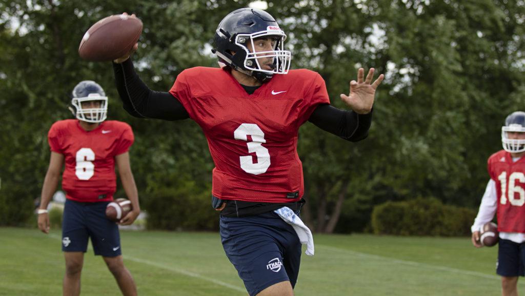 Senior quarterback Joe Germinerio looks to make a pass during a practice Aug. 27. Germinerio was an All-American at The College at Brockport in 2017 before transferring to Ithaca College for the 2019 season.
