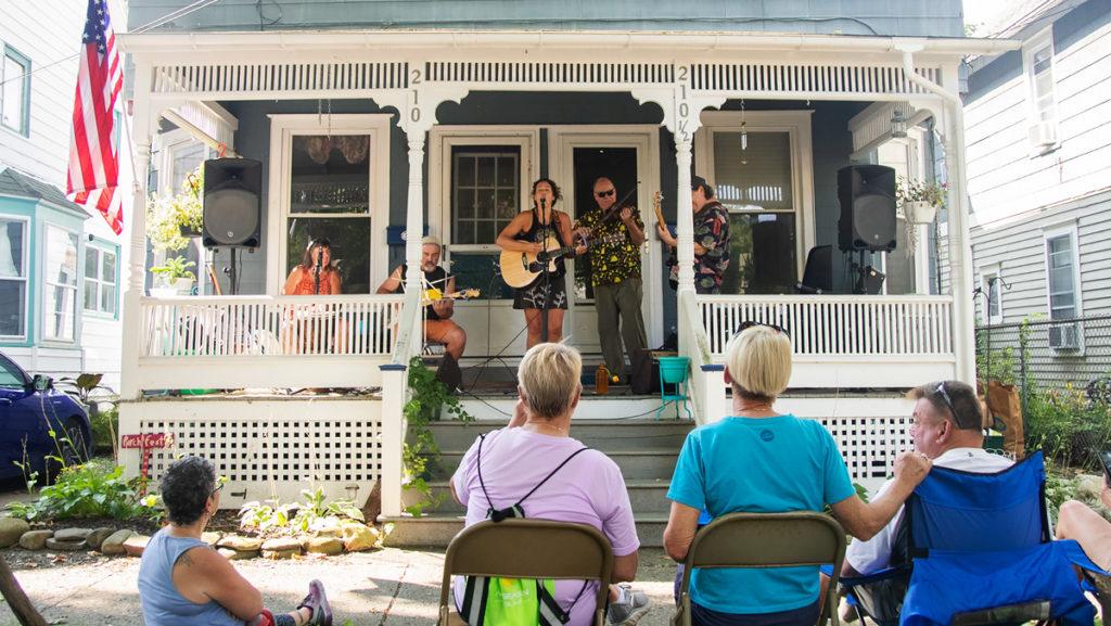 Spectators travel from house to house to watch bands, including Cielle, pictured, perform at Porchfest on Sept. 22 in the Fall Creek and Northside neighborhoods of Ithaca.  