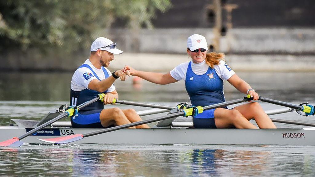 Senior Pearl Outlaw and her partner, Joshua Boissoneau, celebrate their bronze-medal finish at the World Rowing Championships on Aug. 30 in Linz, Austria.