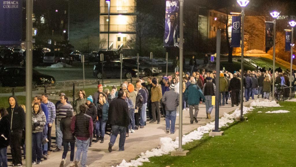 A crowd of concert attendees lines up outside of the Athletics and Events Center to watch Bob Dylan and his band perform Nov. 17. The performers did not allow media photography inside the concert.