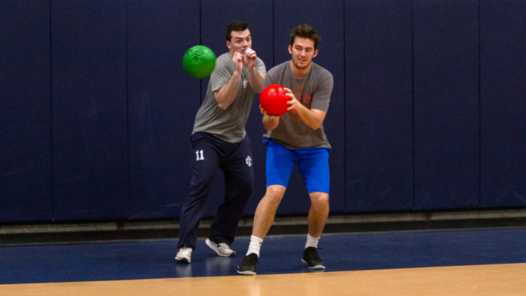 From left, seniors Liam O’Connell and Daniel Lee play in a dodgeball tournament Nov. 14 during Ithaca College’s annual Spirit Week, hosted by Students Today, Alumni Tomorrow.  The events led up to Cortaca at MetLife Stadium. 