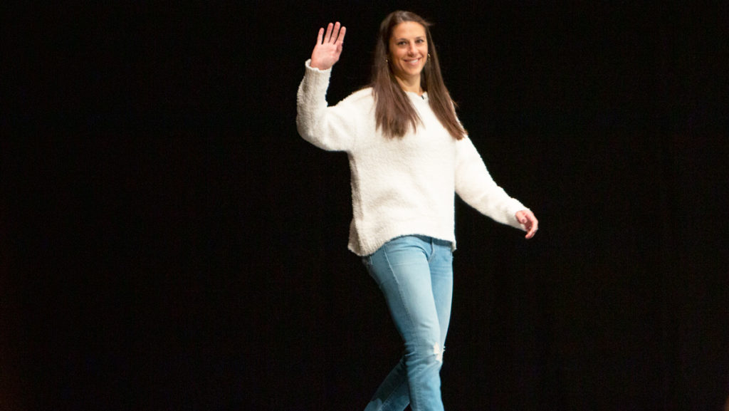 Carli Lloyd walks on stage to discuss the path to her successful soccer career and leadership on and off the field Dec. 6 at Cornell University’s Bailey Hall.