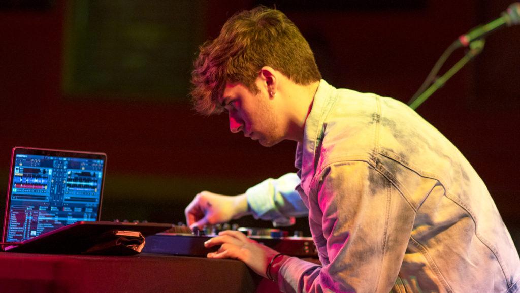 Junior Graham Johnson, an EDM DJ who goes by the stage name Ivy., performed an original electronic dance mix Sunday, Dec. 8, 2019, for a set at the Ithaca College Student Showcase at The Haunt.