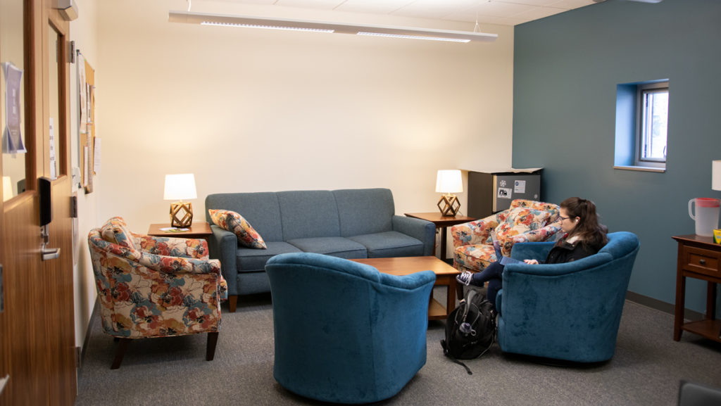 Freshman Sam Pekola studies in the honors student lounge in the Peggy Ryan Williams Center. The honors program will be moving from the garden level of the Peggy Ryan Williams Center to Mueller Faculty Center in Summer 2020.