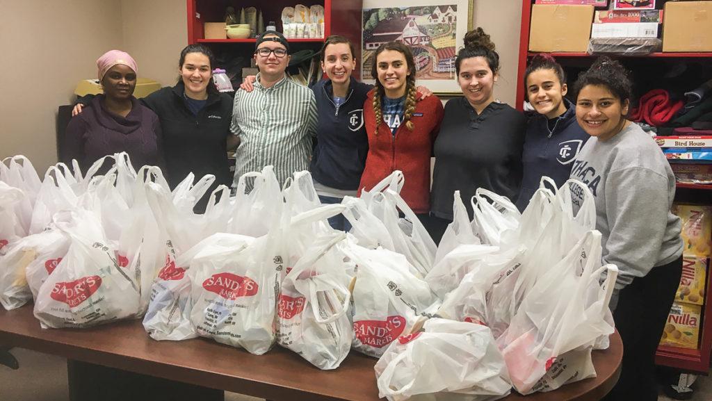 In November, a group of students delivered health promotion lessons to youth at the Salamanca City Youth Center. They pose with snack bags they packed for the children.