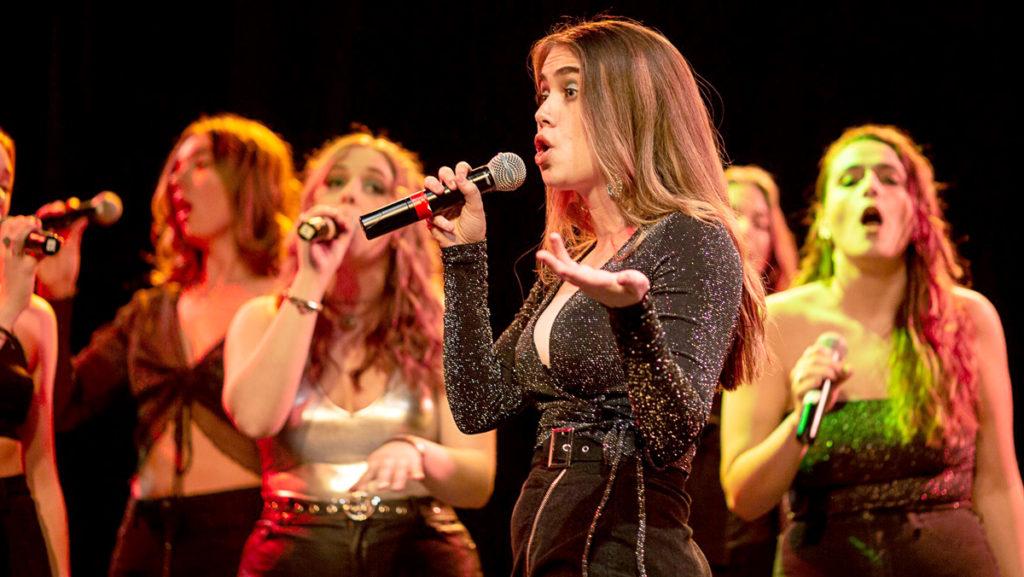Freshman Delia Vaisey preforms Yoü And I by Lady Gaga with Ithaca Colleges all female a cappella group, Premium Blend in November 2019 in Emerson Suites. 