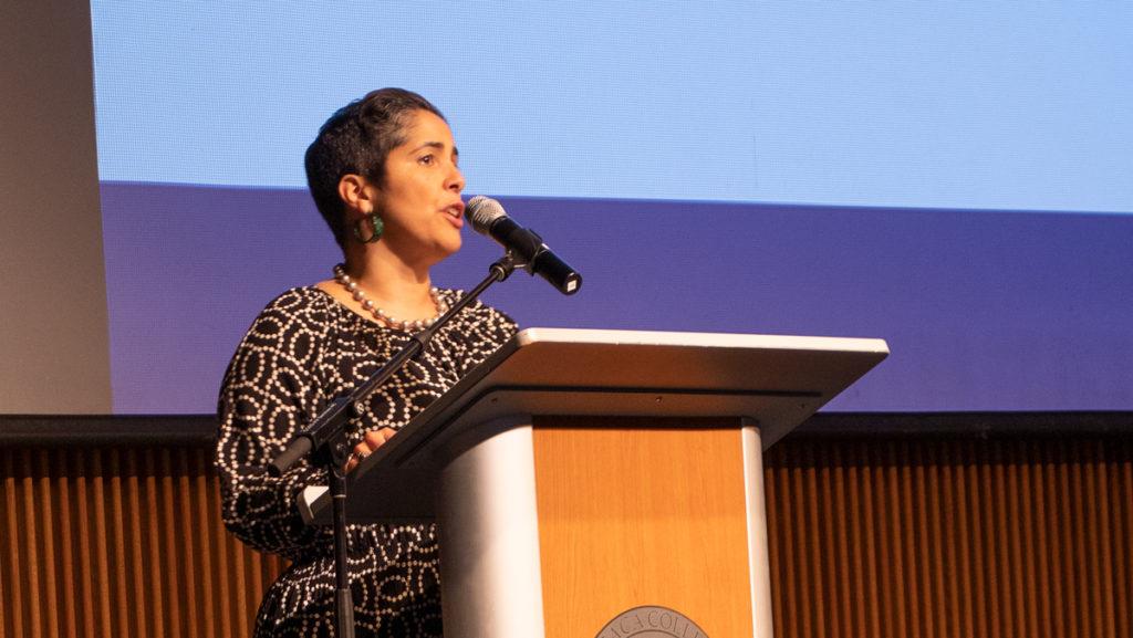 Ithaca College President Shirley M. Collado speaks at the All-College Gathering on Jan. 28. At the gathering, Collado spoke about the college community’s concerns about the campus climate regarding diversity and inclusion and upcoming economic and structural changes. 