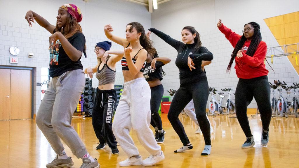 The members of Ithaca College’s Pulse Hip Hop Team rehearse their heel dancing routine for their upcoming spring semester showcase Feb. 23 in the Emerson Suites.