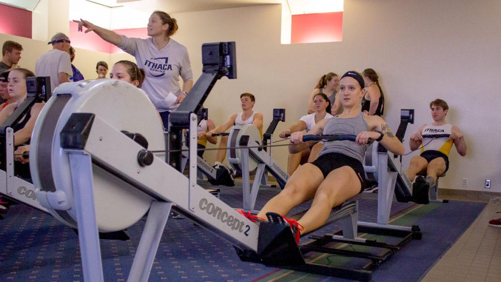 Senior rower Kelly Csernica rows along side teammates during Row for Humanity, which benefits Ithaca College Habitat for Humanity