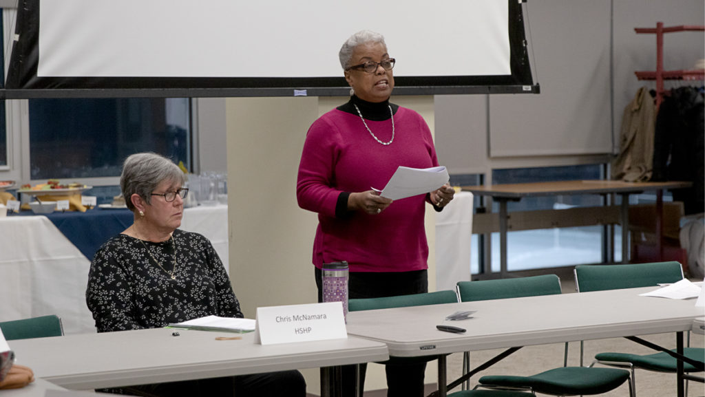 From left, Chris McNamara , clinical associate professor and clinical director in the Department of Physical Therapy and chair of the Ithaca College Faculty Council, and La Jerne Cornish, provost and senior vice president for academic affairs, speak at a Faculty Council meeting Dec. 3, 2019.