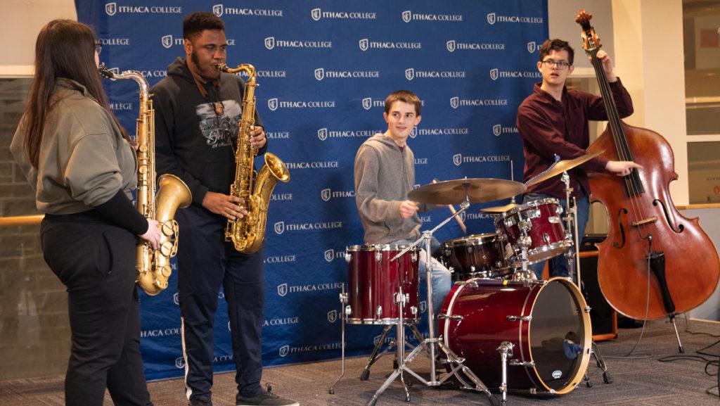 Sophomore Ali DeRagon, freshman Drew Martin, sophomore Henry Sauer and junior August Bish  play at the IC Jazz Club’s open mic night. The event happens Thursdays in the Towers Marketplace.