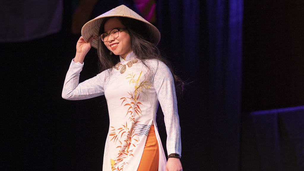 Senior Vy Trinh struts on the catwalk at Interfashional Night. The event is hosted by the Ithaca College International Club (ICIC) and was held Feb. 27.