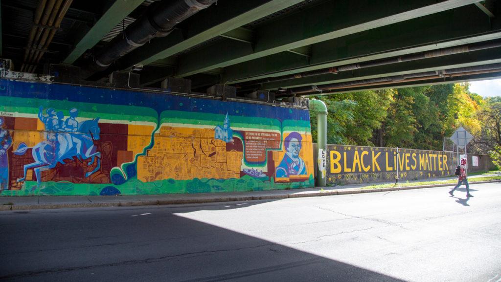 Ten years after the original Underground Railroad mural displayed beneath the Aurora Street bridge on Green Street was painted, it is being revitalized by four local artists.