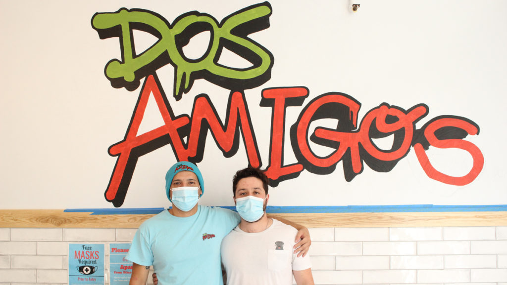 From left, Antonio Luis Ibanez, general manager of Dos Amigos, and Jorge Bouras, owner and co-founder, opened the restaurants first brick and mortar on June 18 at 403 College Ave. Even with COVID-19 putting pressure on restaurants, new restaurant owners in Ithaca have found ways to open their doors.