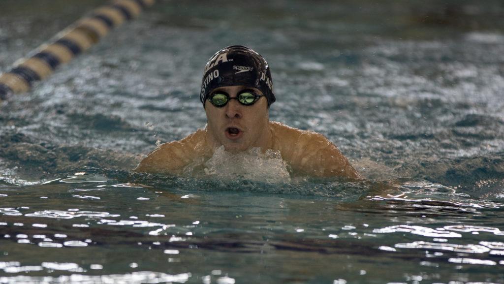 Junior swimmer Nick DAgostino competes in the 50-yard breaststroke Feb. 20 in the Bombers are Back Time Trial at the Kelsey Partridge Bird Natatorium.