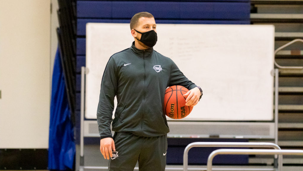 Sean Burton ‘09, men’s head basketball coach, oversees practice Feb. 27 in Ben Light Gymnasium. Burton earned All-American honors three times as a Bomber.