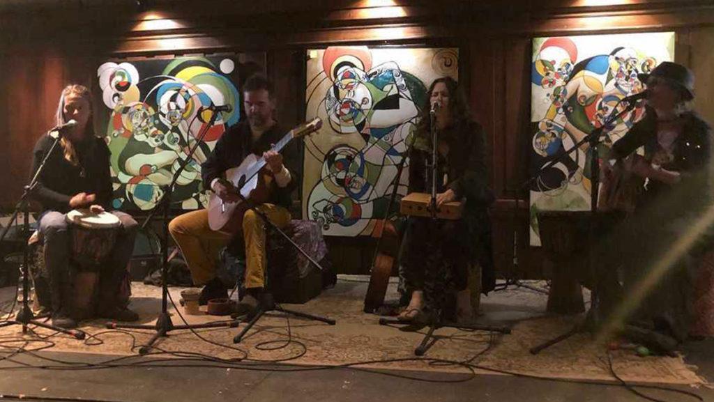 From left, Devon Buckley, Johnny Driscoll, Eliana Maharani and Aria Dawn Tiphereth perform April 10 at Sacred Root Kava Lounge and Tea Bar. This was the bars first live show since the pandemic. 
