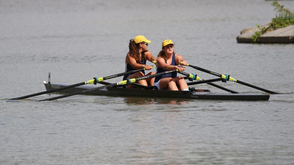 From left, senior Izzy Ozkurt and junior Lauren Hitesman row in the Cayuga Sprints on Sept. 26. Hitesman is in her third season with both the sculling and women's crew teams. 