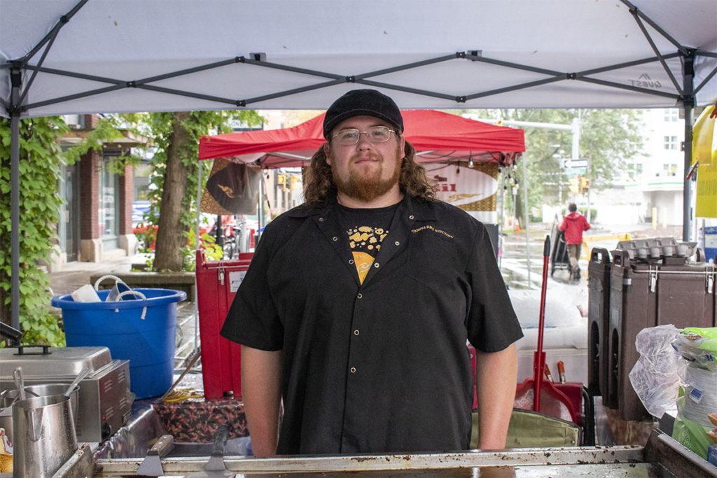 John Bean worked the potato pancakes booth Oct. 3, the final day of Apple Fest. Although it continued to rain, Bean was not too worried because he said Saturday was amazing. “We had a line of people reaching around our booth around to the back, and it was amazing to see people out and enjoying themselves,” Bean said. Although there are less food vendors at this year’s Apple Fest than previous years, Bean said he believes that everyone has done exceptionally well with sales this year, and is incredibly grateful for everyone that participated in Apple Fest. Nolan Saunders/The Ithacan