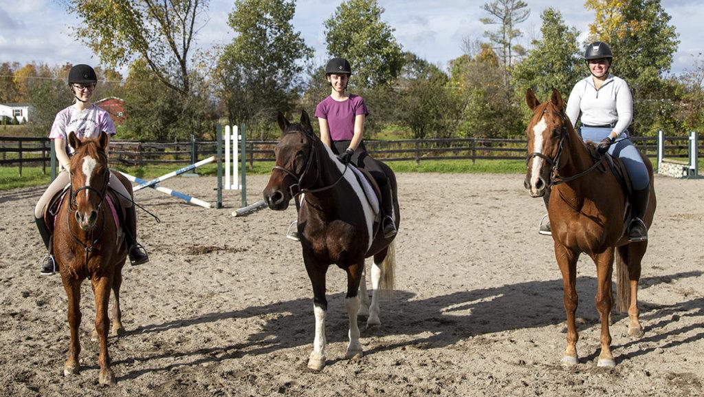 From left, Taylor Hagquist, Sonia Alfandre and Sarah Cashton at If Only Farm in Freeville, New York. The club competed in its first meet of the fall show season Oct. 16 at the RIT doubleheader tournament in Rochester, New York. Its next show is Oct. 24 at Cornell University. 