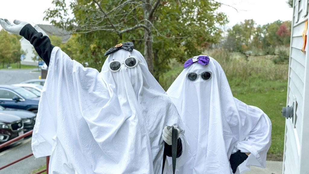 These two not-so-spooky ghosts glided from apartment to apartment dressed in sunglasses and bows Oct. 24 at the Circle Apartments Autumn Fest. 