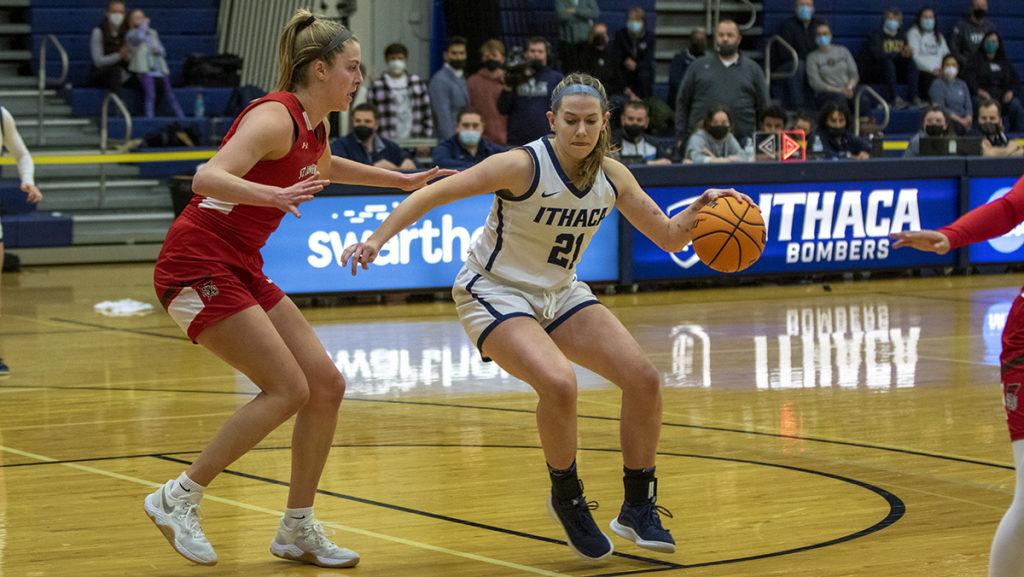 Junior forward Emily Dorn drives to the basket during the Ithaca College women's basketball team's 70–58 victory over St. Lawrence University on Feb. 27 at Ben Light Gymnasium.