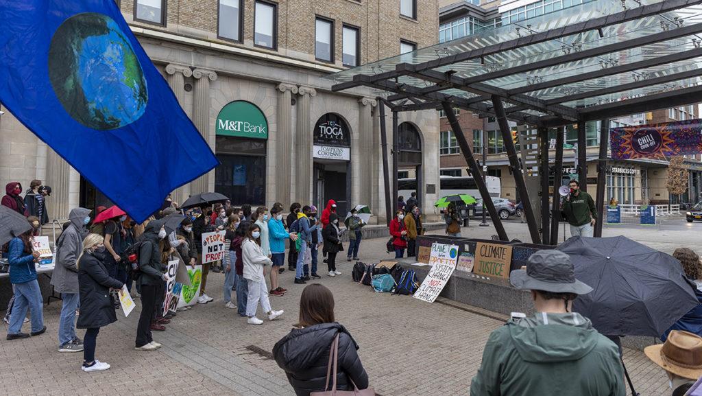 On March 25, protestors holding signs that read “Planet before profits” and “System change not climate change!” filled the Bernie Milton Pavilion in support of climate justice. Their demands are part of a movement to strengthen Ithaca’s Green New Deal through climate justice efforts