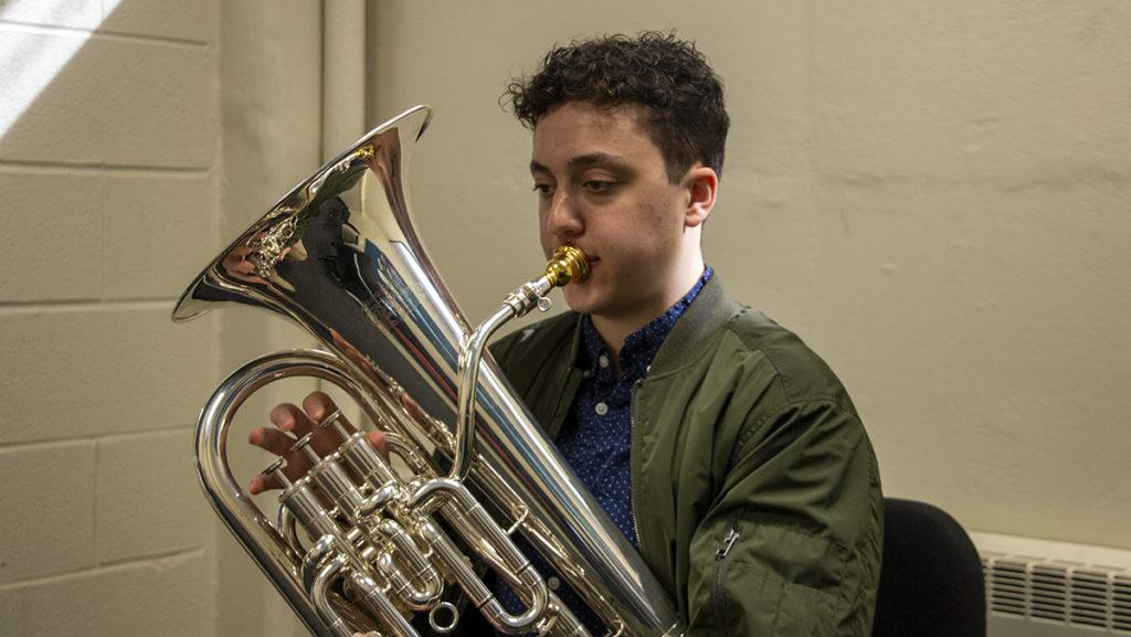 Junior Isaac Schneider is one music student taking part in Music as Medicine, a collaboration between Ithaca College and Cayuga Medical Center to provide music to hospital patients.