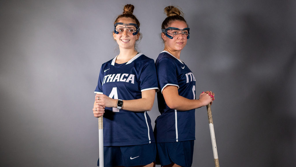From left, senior midfielder Megan Motkowski and graduate student midfielder Alexa Ritchie. The Ithaca College womens lacrosse team graduated nine athletes last year, but it still expects to be a contender.
