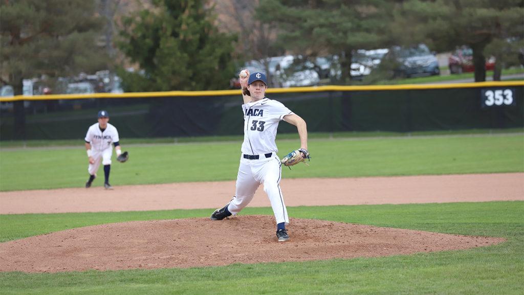 From left, freshman second baseman Riley Brawdy prepares to field behind senior pitcher Kyle Lambert during the Ithaca College baseball teams 5–2 victory against the University of Rochester on April 23.