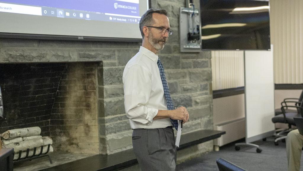 Tim Downs, vice president for Finance and Administration at Ithaca College, gives the Student Governance Council a presentation on the college's finances April 25.