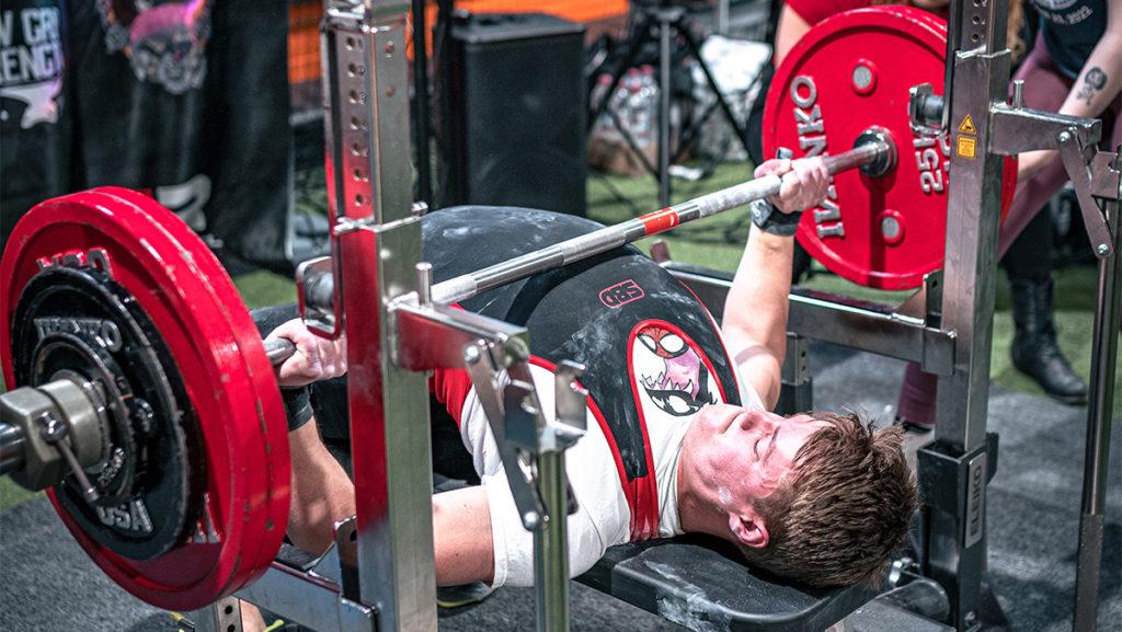 Ithaca College senior David Alstott, who will attend graduate school at Columbia University in the fall, set a Connecticut state record in bench press in a competition April 23 with 155 kilograms.