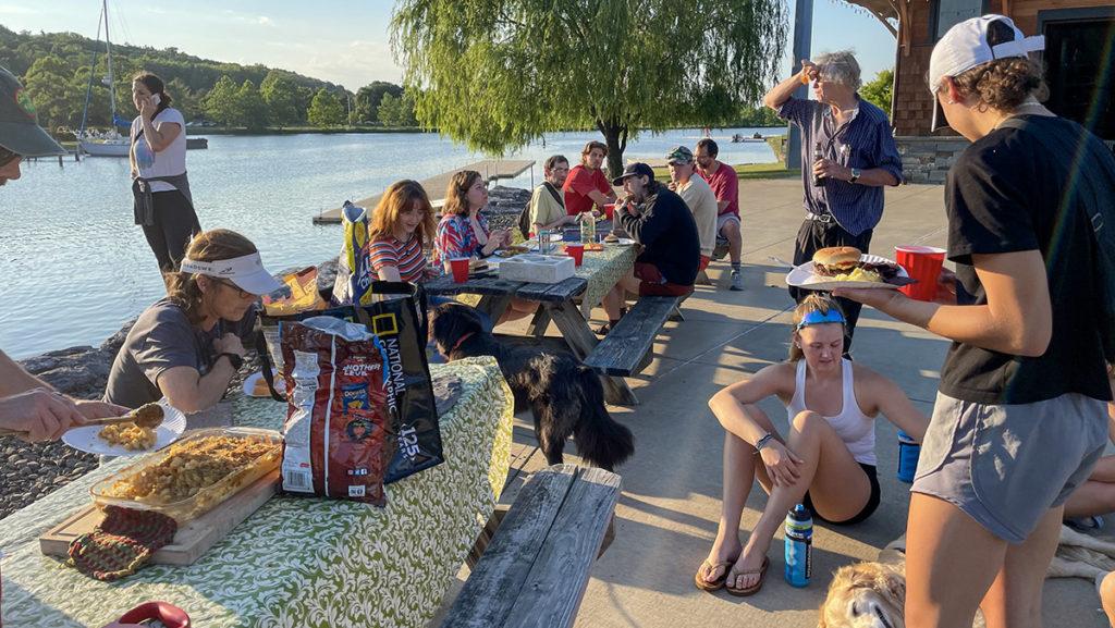 The+Ithaca+College+mens+and+womens+crew+teams+met+Thursday%2C+June+23+at+the+Cayuga+Inlet+for+their+weekly+cookout.+Former+mens+head+coach+Dan+Robinson+79+said+the+teams+have+been+hosting+the+event+for+over+30+years.