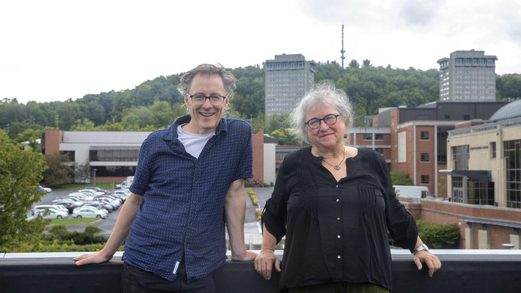 From left, John D. Scott, associate professor in the Department of Media Arts, Sciences and Studies and Documentary Studies program director, poses with the subject of his new documentary, Susannah Berryman, emeritus professor of Theatre Arts.