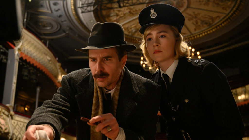 Inspector Stoppard (Sam Rockwell) and Constable Stalker (Saoirse Ronan) investigate a murder in See How They Run.