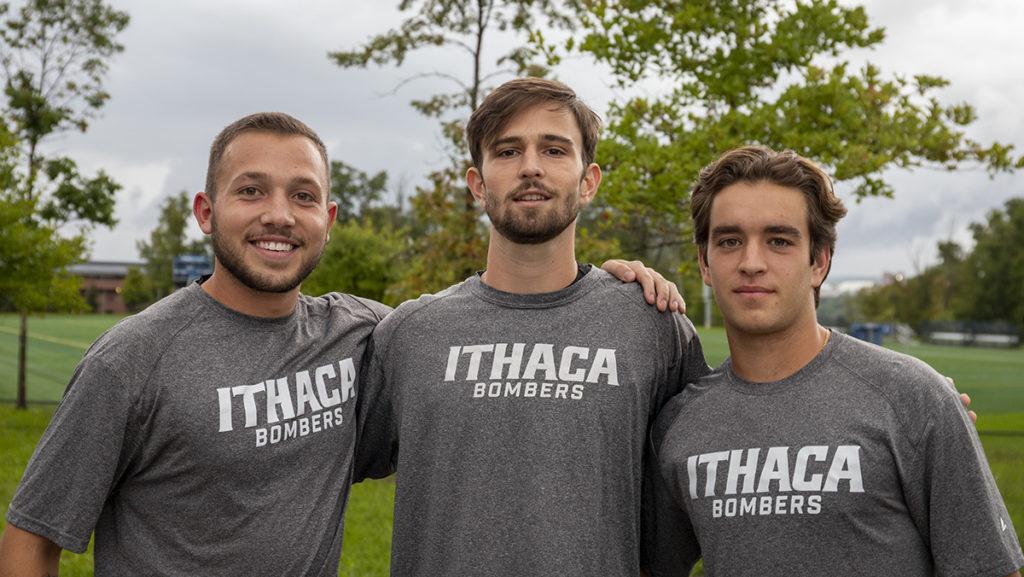 From left, junior Ian Oltman, junior Emmett Delesie, and sophomore Jack Longo all transferred to Ithaca this season to help the Bombers reach their championship aspirations. 
