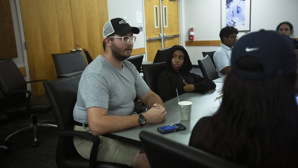 Senior Connor Watson, assistant to the vice president of Business and Finance, and sophomore Hannah Ahmed, Class of 2025 senator, attend the SGC meeting Sept. 19. 