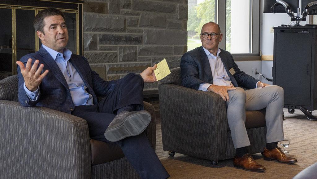From left, David Lissy ’87, chair of the Board of Trustees, and James Nolan ’77, vice president of the board, meet with the campus community in Fall 2022. The Board of Trustees recently reconvened for its Spring 2023 meetings earlier in May.