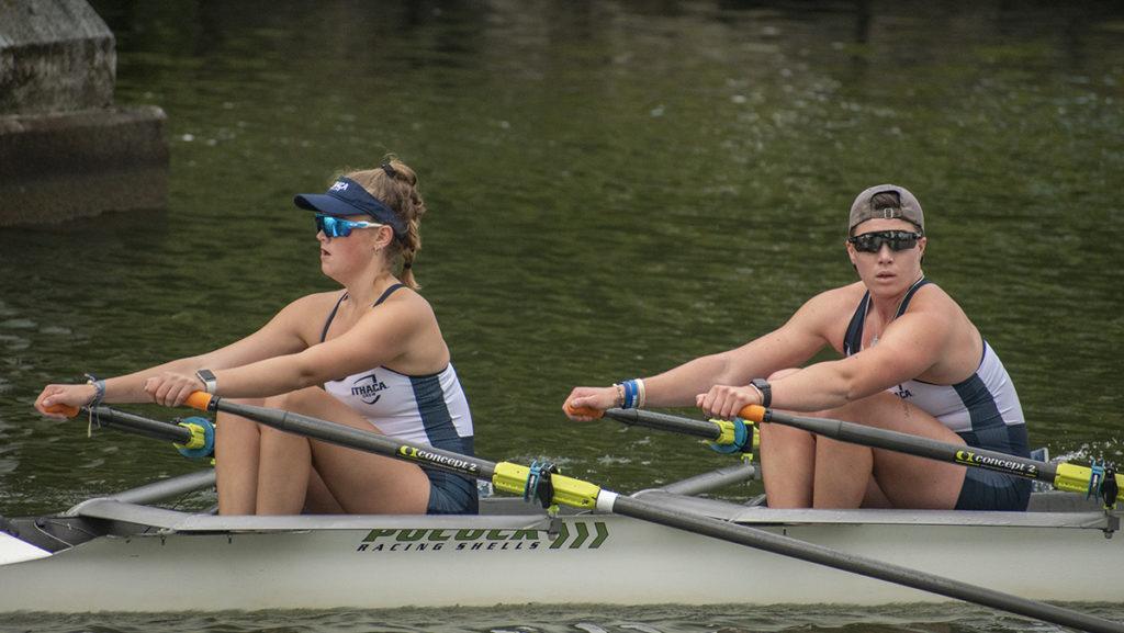 From left, Katrina Pohlman 23 strokes while graduate student Taylor Volmrich bows during a doubles race. Volmrich is entering their fifth year with the rowing program.