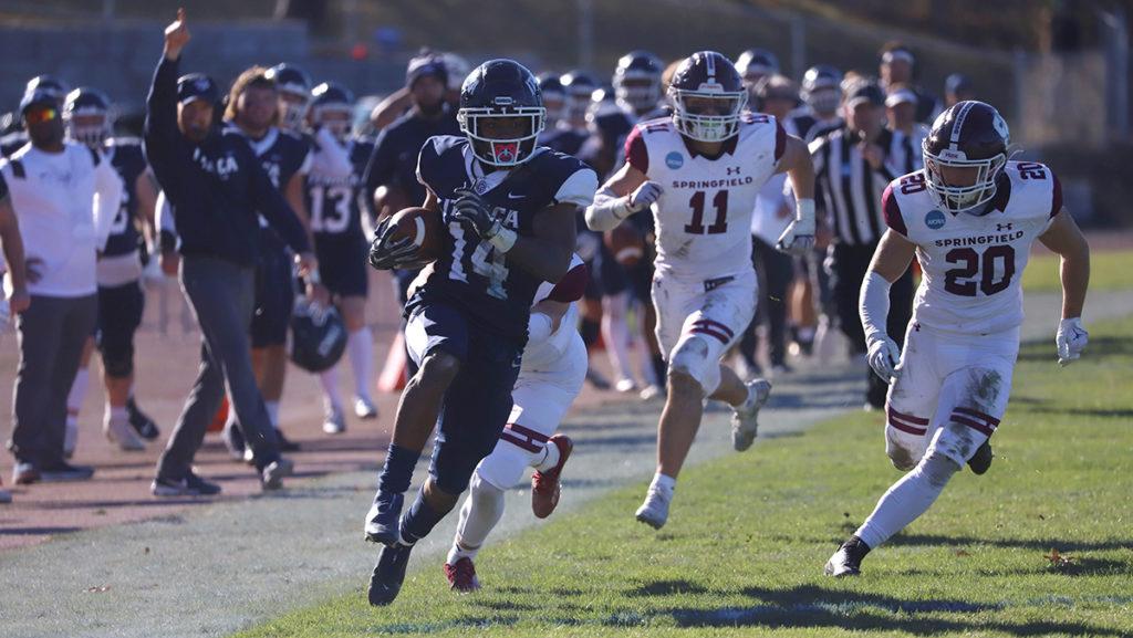From left, junior running back Jalen-Leonard Osbourne evades tackles from sophomore linebacker Will McKay and sophomore defensive back Tyler Pohlman of the Springfield Pride en route to a 49-yard touchdown reception.