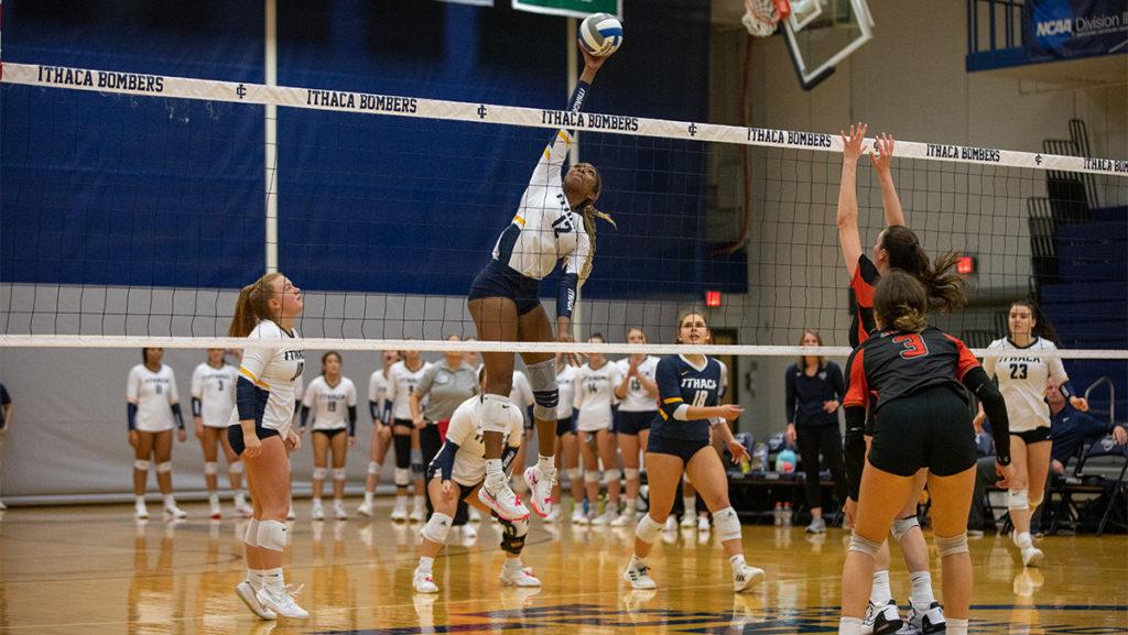 Sophomore middle blocker Aleka Darko winds up for a spike in the Ithaca College volleyball teams 3–0 win over the Rochester Institute of Technology.