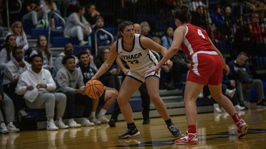 From left, graduate student guard Cara Volpe forward tries to get around graduate student guard Julia Siler of the Red Dragons.