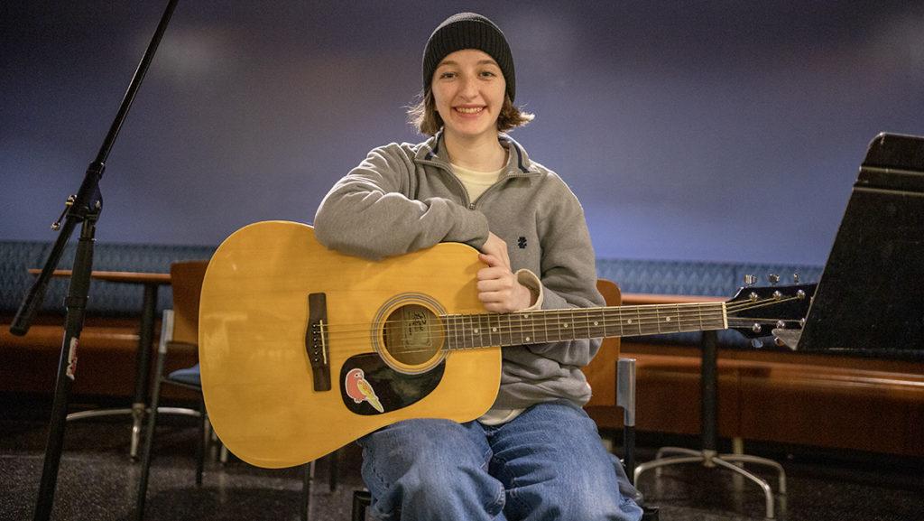 Sophomore Ally Aretz highlights the importance of creative expression through clubs on campus like Open Mic Night, which welcomes performers of all backgrounds.