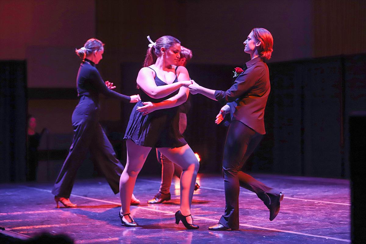 From left, sophomores Daria Flegontova, Mary Rion and junior Anne Culbert perform in association with the Ithaca College Ballroom Dance club Nov. 4. JASMINE SCRIVEN/THE ITHACAN