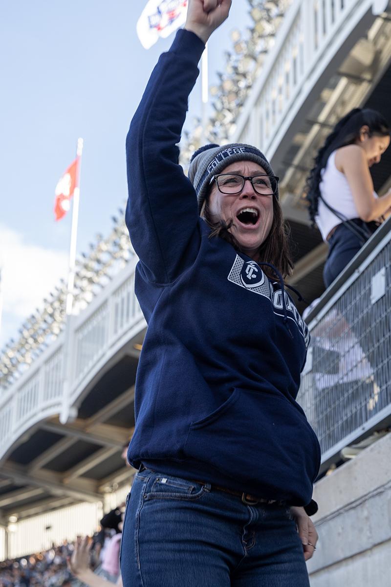 Jeanette Pursell shows her support and enthusiasm for the Bombers performance at the 63rd Cortaca Jug game. XIAOYI ZHANG/THE ITHACAN