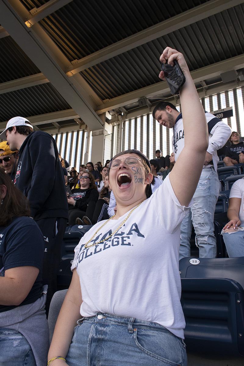 Ithaca College alum Eliza Wildes ’20 cheers for the Bombers during their impressive start of the 2022 Cortaca Jug game. KALYSTA DONAGHY-ROBINSON/THE ITHACAN