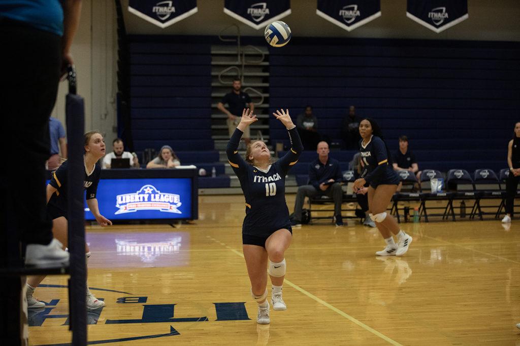 Junior defensive setter Peyton Miller prepares to set the ball. The Ithaca College volleyball team extended its winning streak to six games with a win over Eastern University.