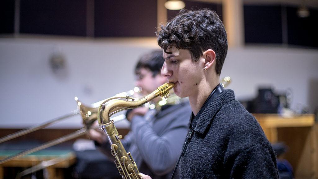 First-year student Mathew Hastava plays the saxophone with others at the Jazz Jams session. The club is open to all students, regardless of musical experience.