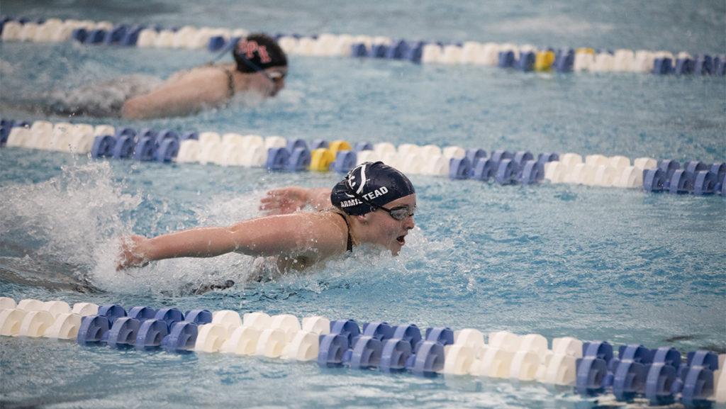 First-year student Caroline Armistead swims the butterfly during the 400-yard individual medley during day two of the Liberty League Championships on Feb. 16. Armistead came in 11th place in the event.